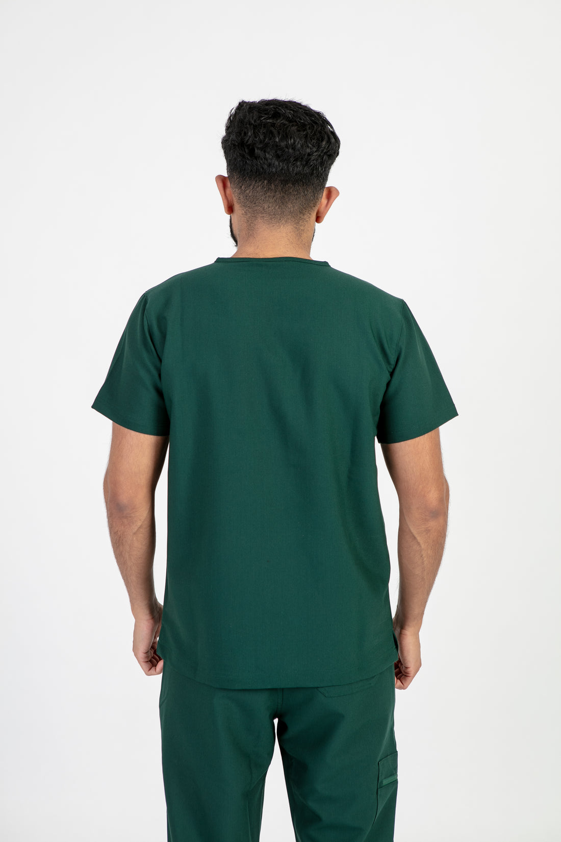 PAX Sequi men's forest green scrub top, back view of the top
