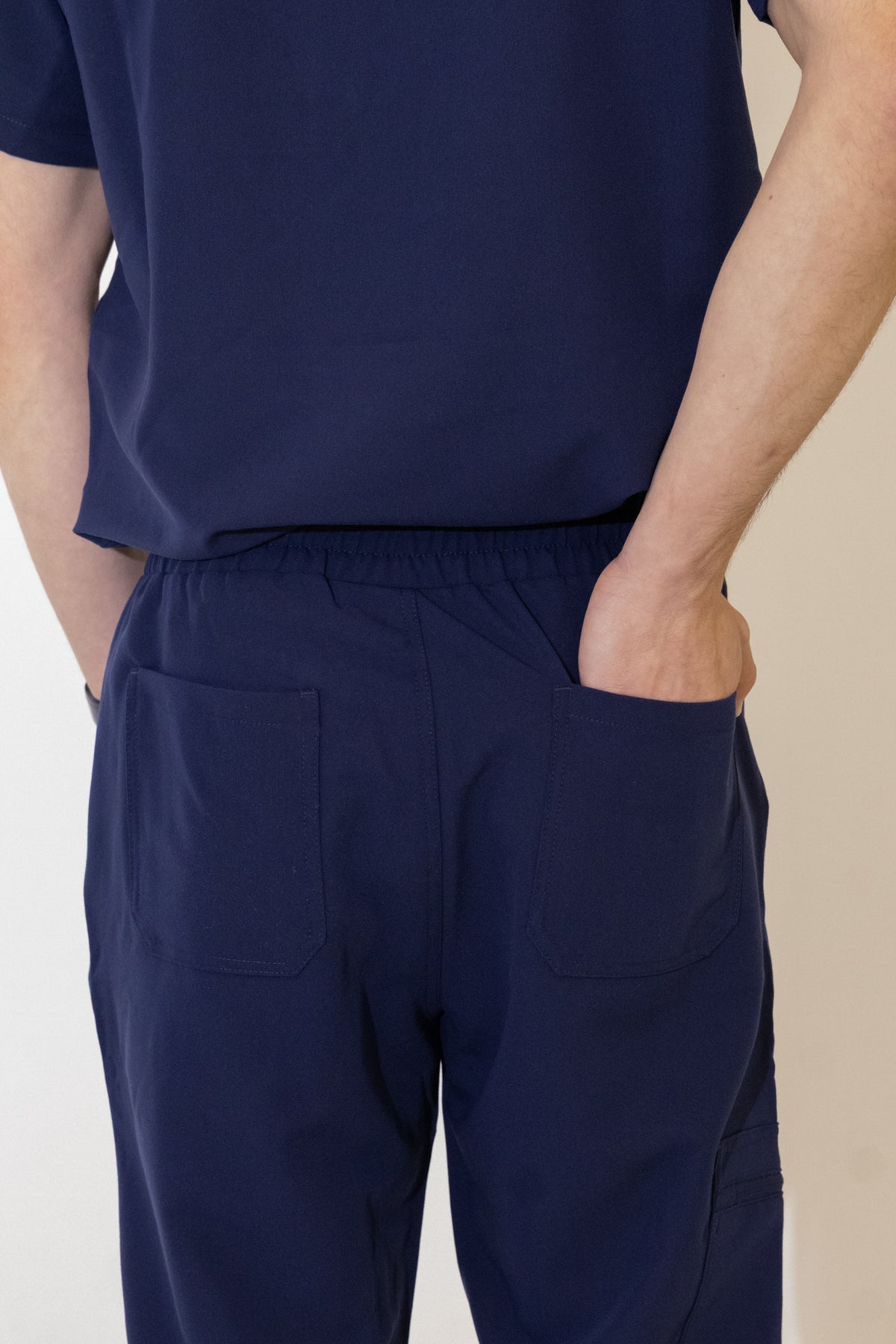 PAX Core Sequi men's navy straight-leg scrub trousers, rear waistband and back pocket detail
