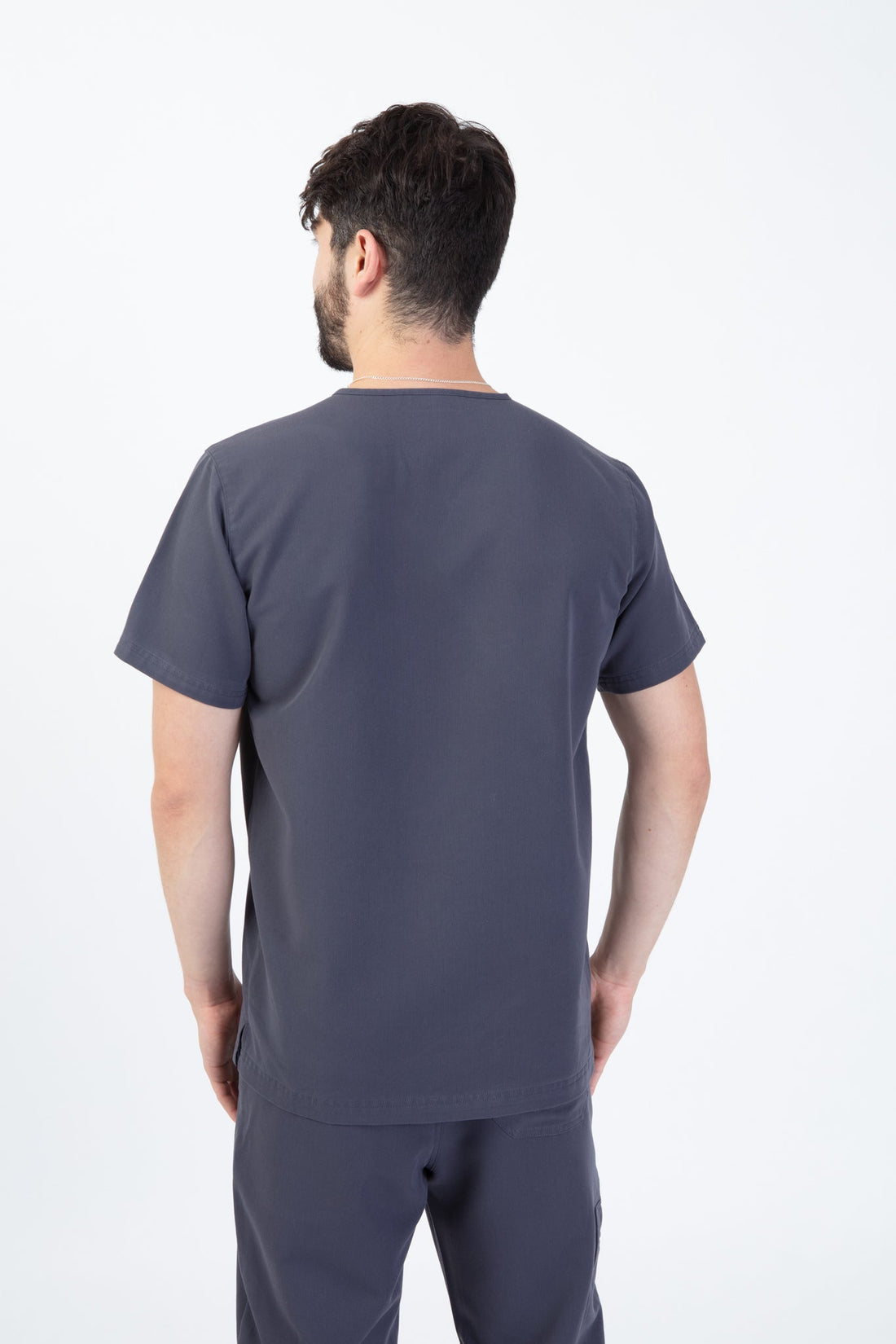 PAX Sequi men's grey scrub top, back view of the top