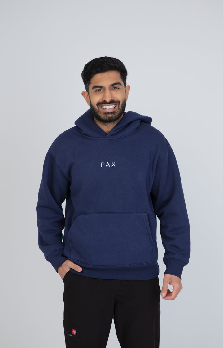 PAX Everywhere navy hoodie, front view on model